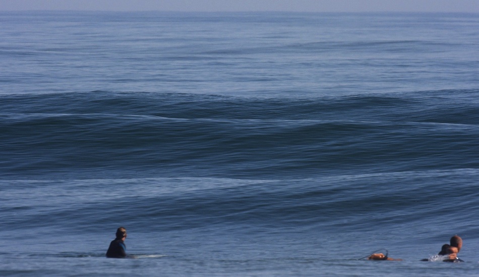 Hot and glassy, only a couple guys out.  Photo: Mickey McCarthy.